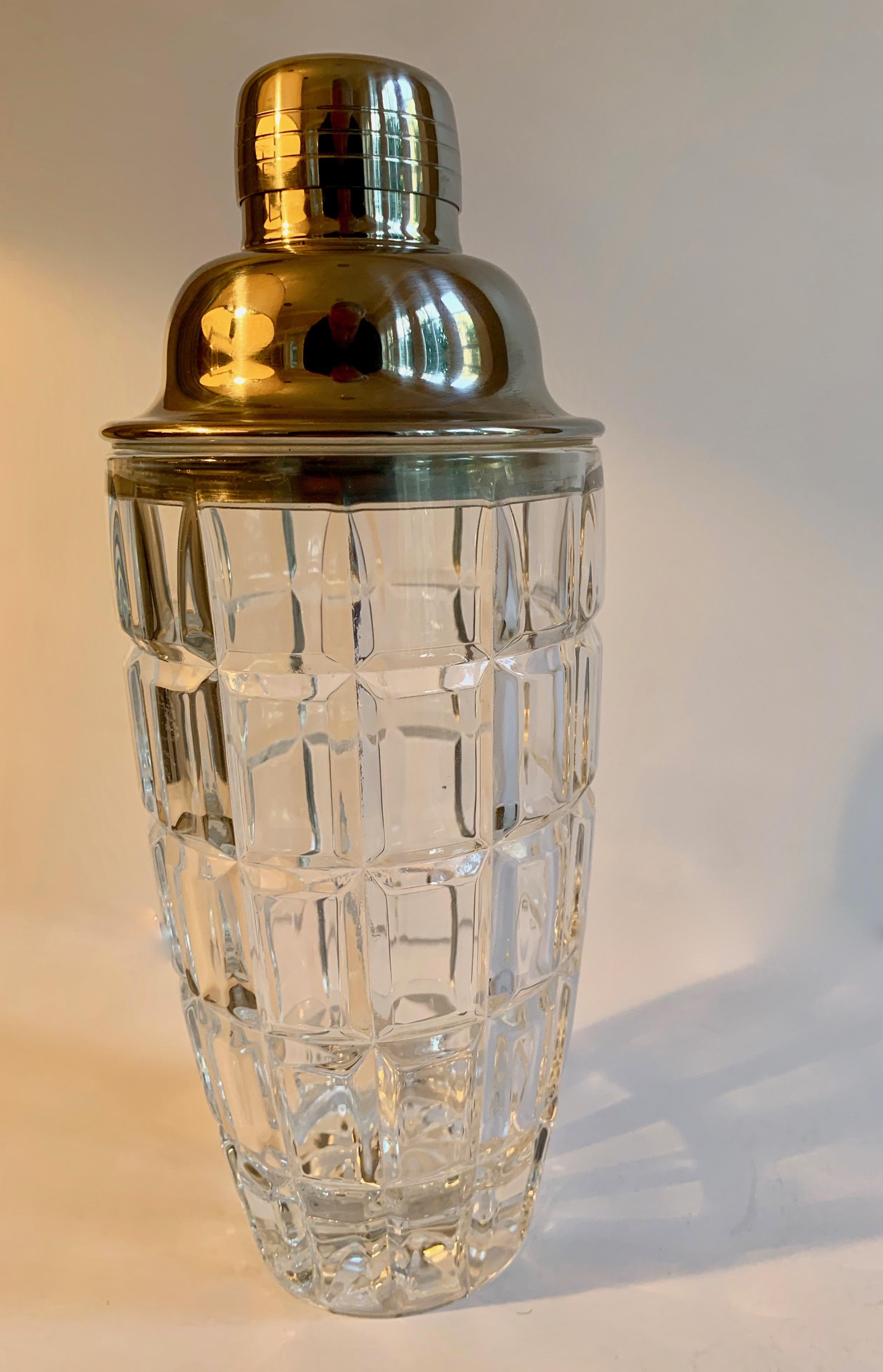 Stunning cut crystal cocktail shaker, crystal portion has leak proof rubber connection. The crystal shaker can stand alone as a vessel, or could even be a vase!