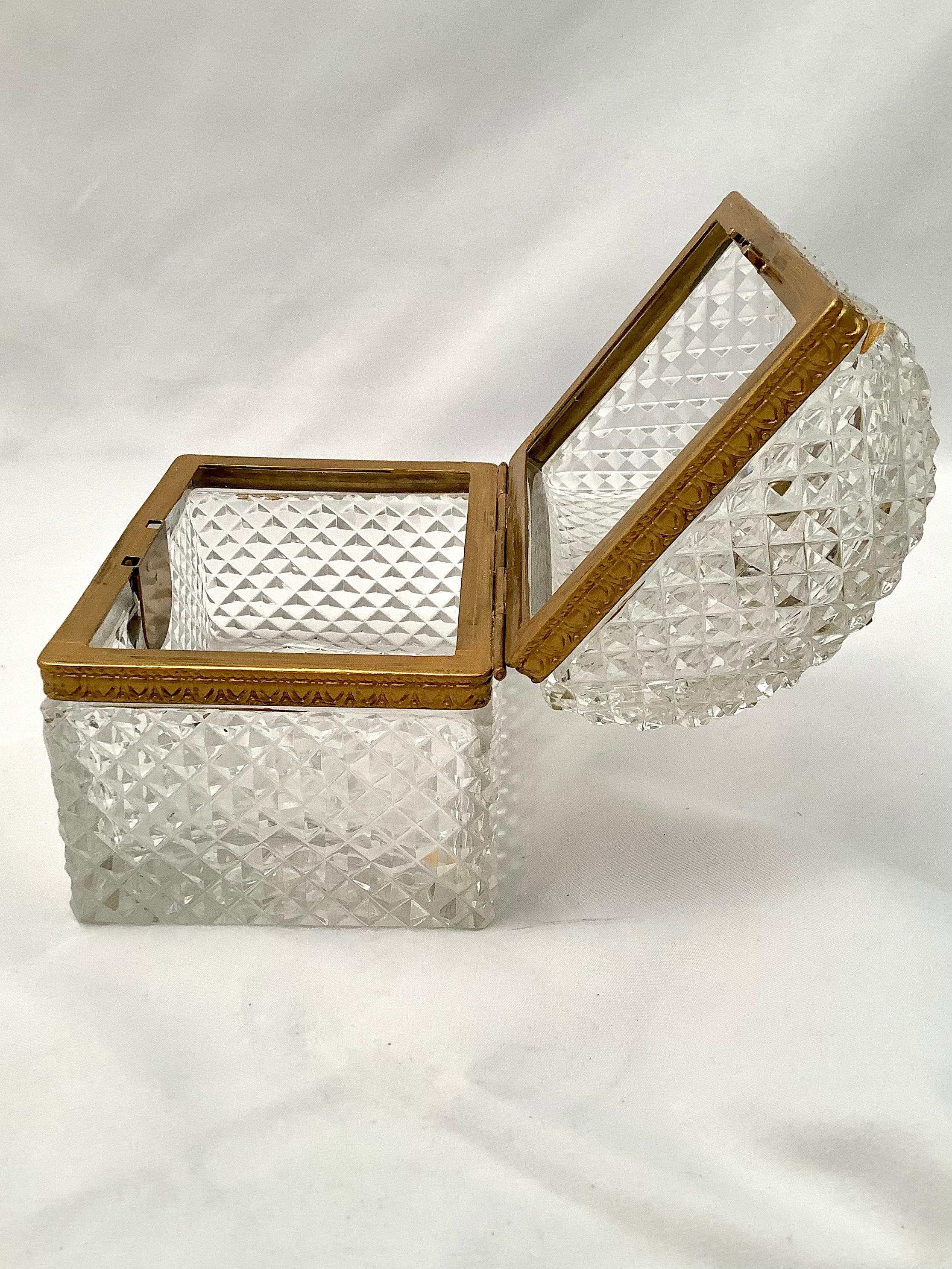 Early 20th century French cut crystal & brass dome shaped box with handle and key hole. Star pattern on bottom.