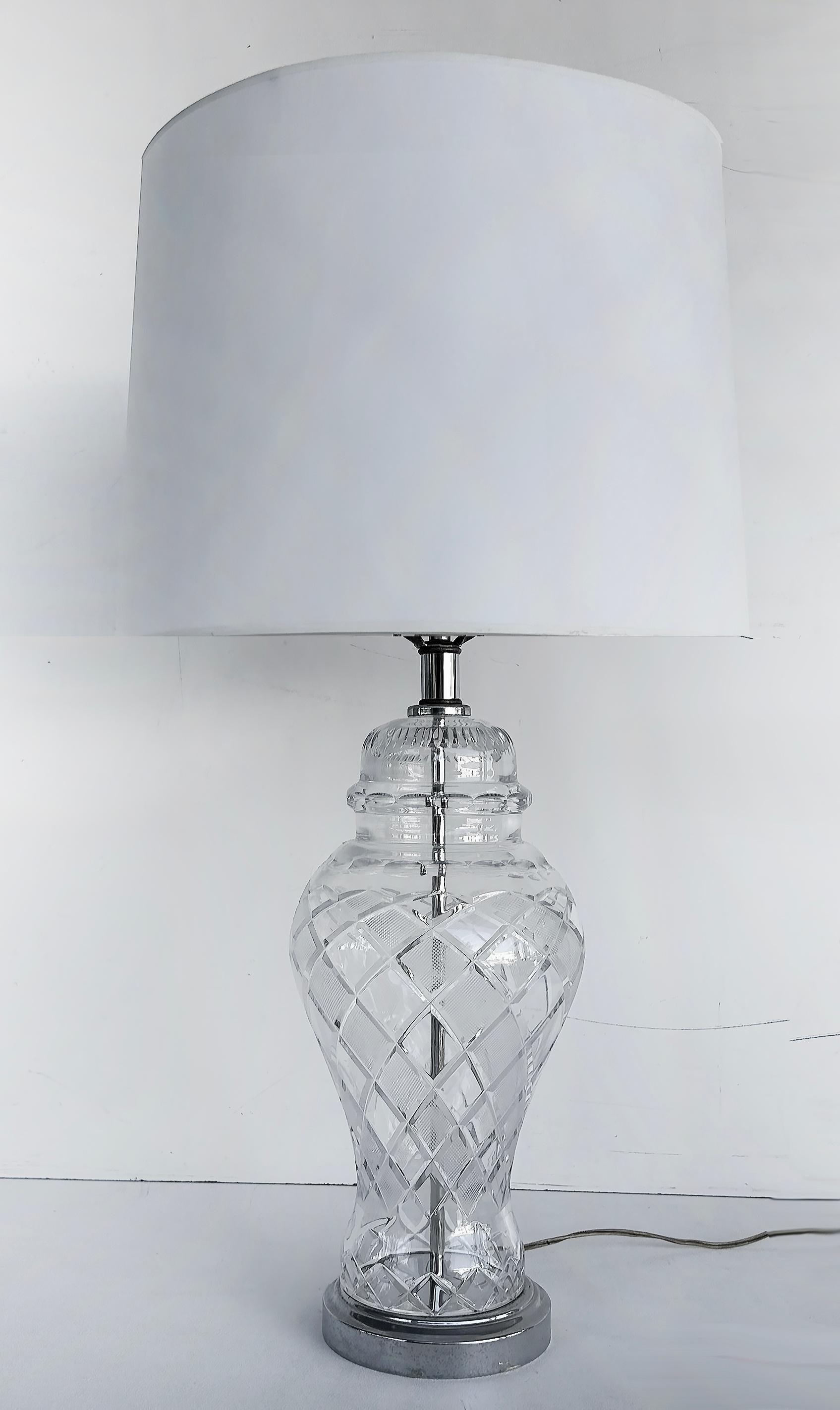 Cut Crystal Table Lamps with Metal Bases Attributed to Waterford Crystal Ireland

Offered for sale is a pair of cut crystal table lamps with chrome metal bases attributed to the Waterford Crystal company of Ireland.  These lamps are unmarked so we