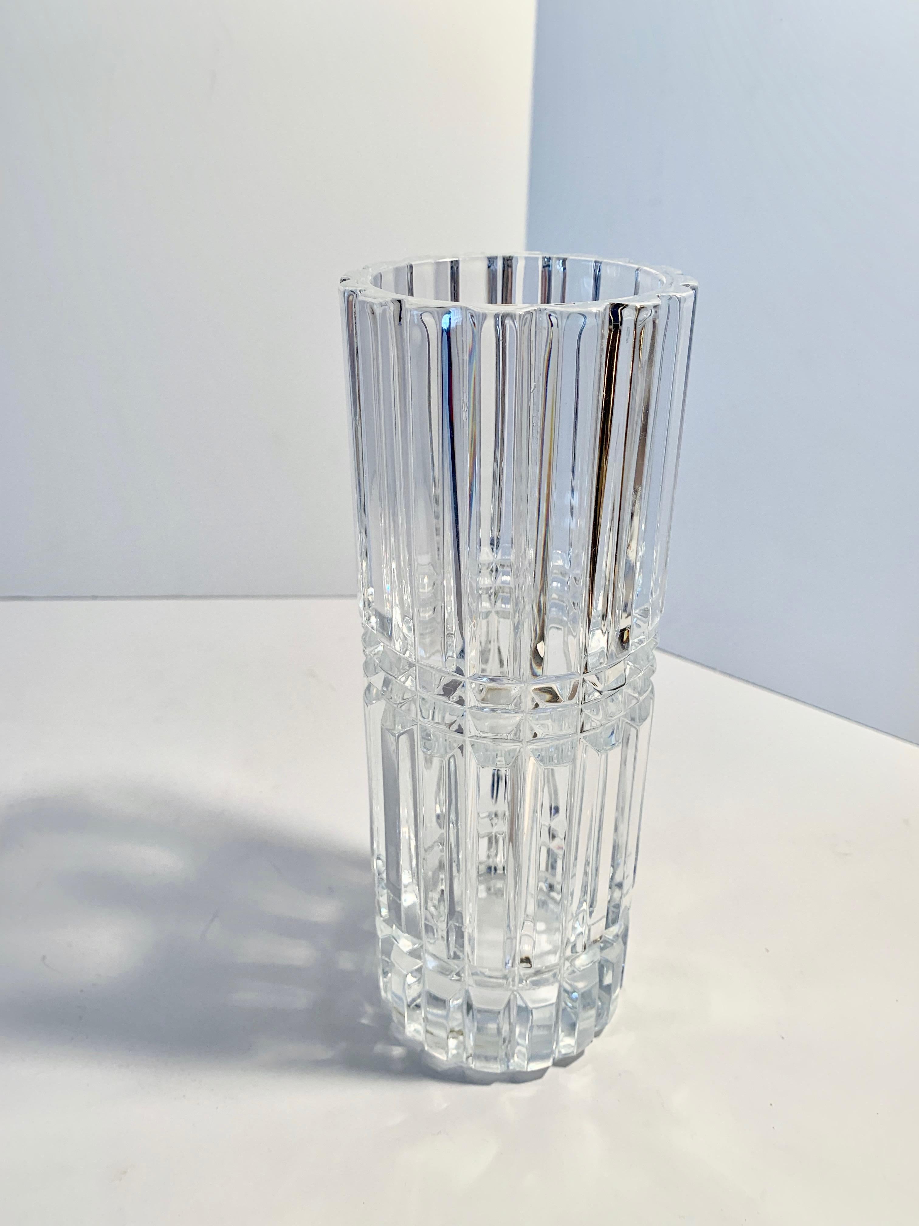 A stunning vase with architectural lines cut vertical with details for a bold modern look - perfect for any table or shelf!