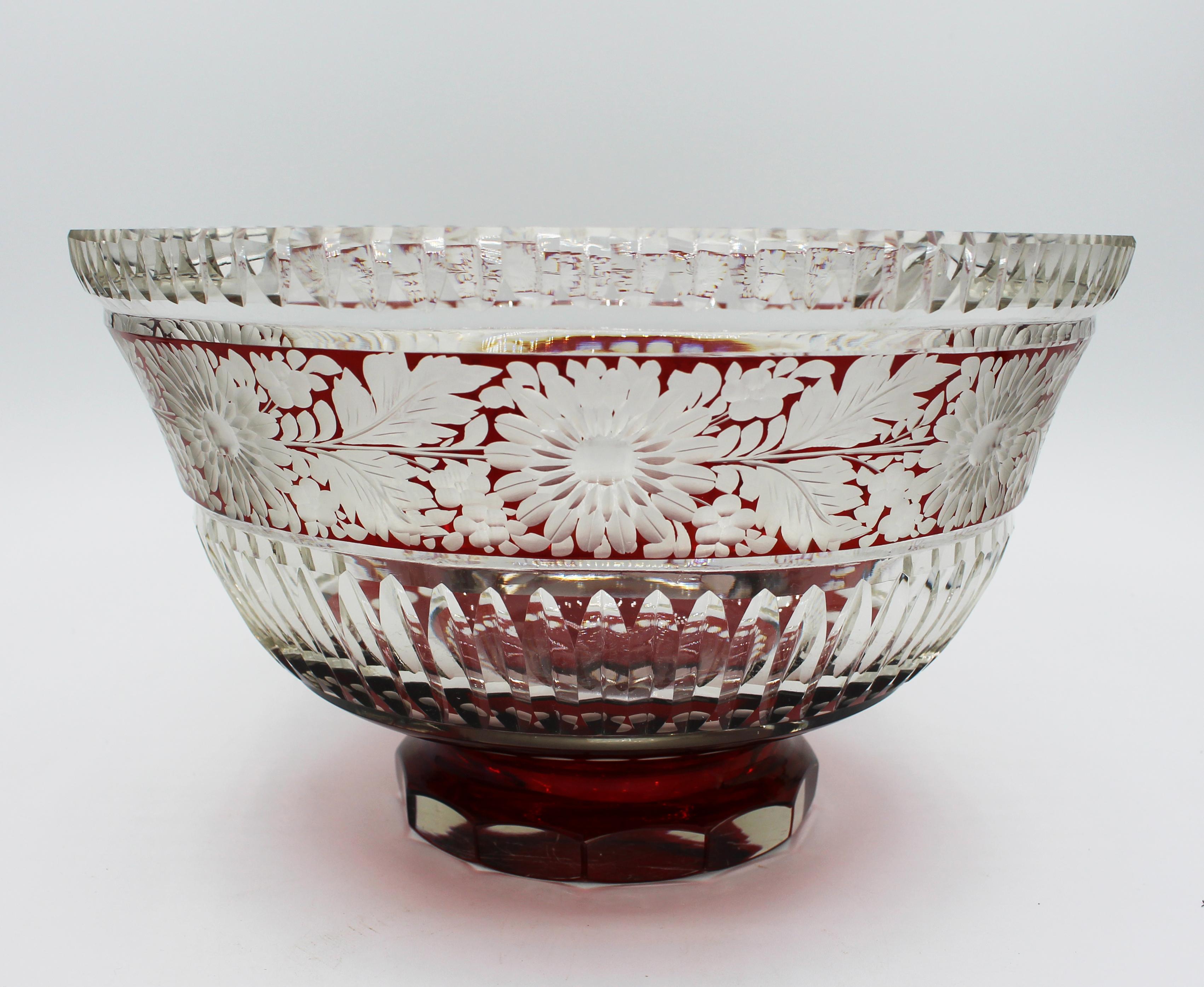 A cut, engraved and ruby flashed glass center bowl - a tour de force of brilliant cut glass work. Regency taste. c.1900. Measures: 9 3/4
