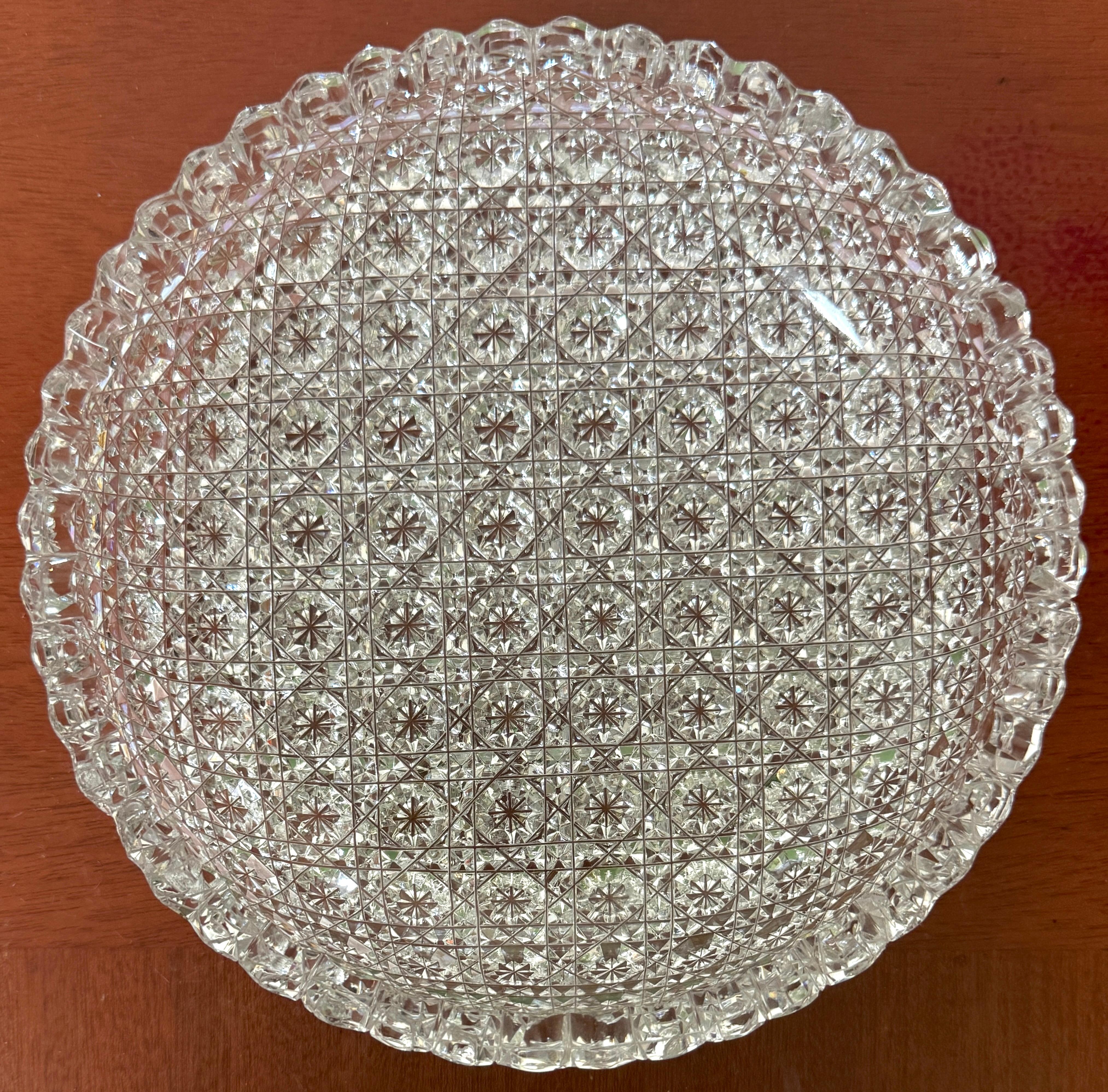 Rare/Custom American Brilliant Cut Glass Bowl with Hobstar Grid Pattern—Attributed to T.G. Hawkes & Co., Circa 1890–1910

This superb American Brilliant Period cut glass bowl is attributed to the renowned firm T.G. Hawkes & Co., based on stylistic