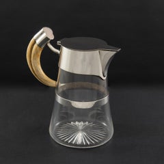 Cut Glass Claret Jug with Sterling Silver Mounts and Boars Tusk Handle, 1898
