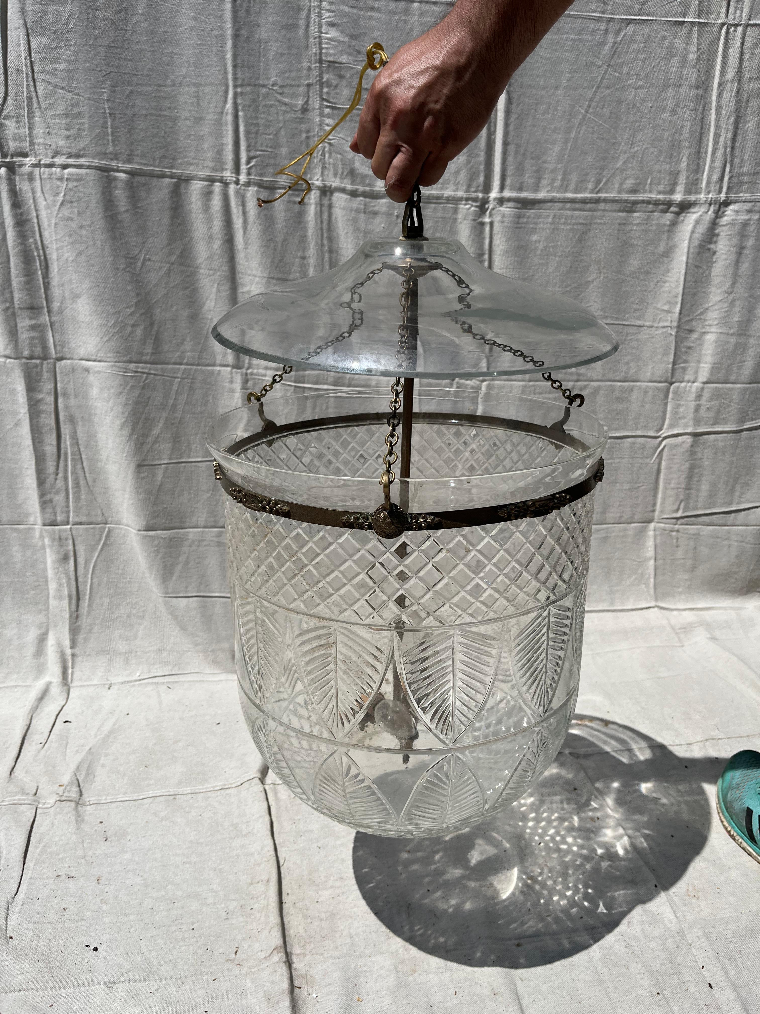 A fine reproduction cut-glass hurricane hall light, with 3-bulb cluster and glass smoke shade, suspended by brass chain with canopy (not pictured).