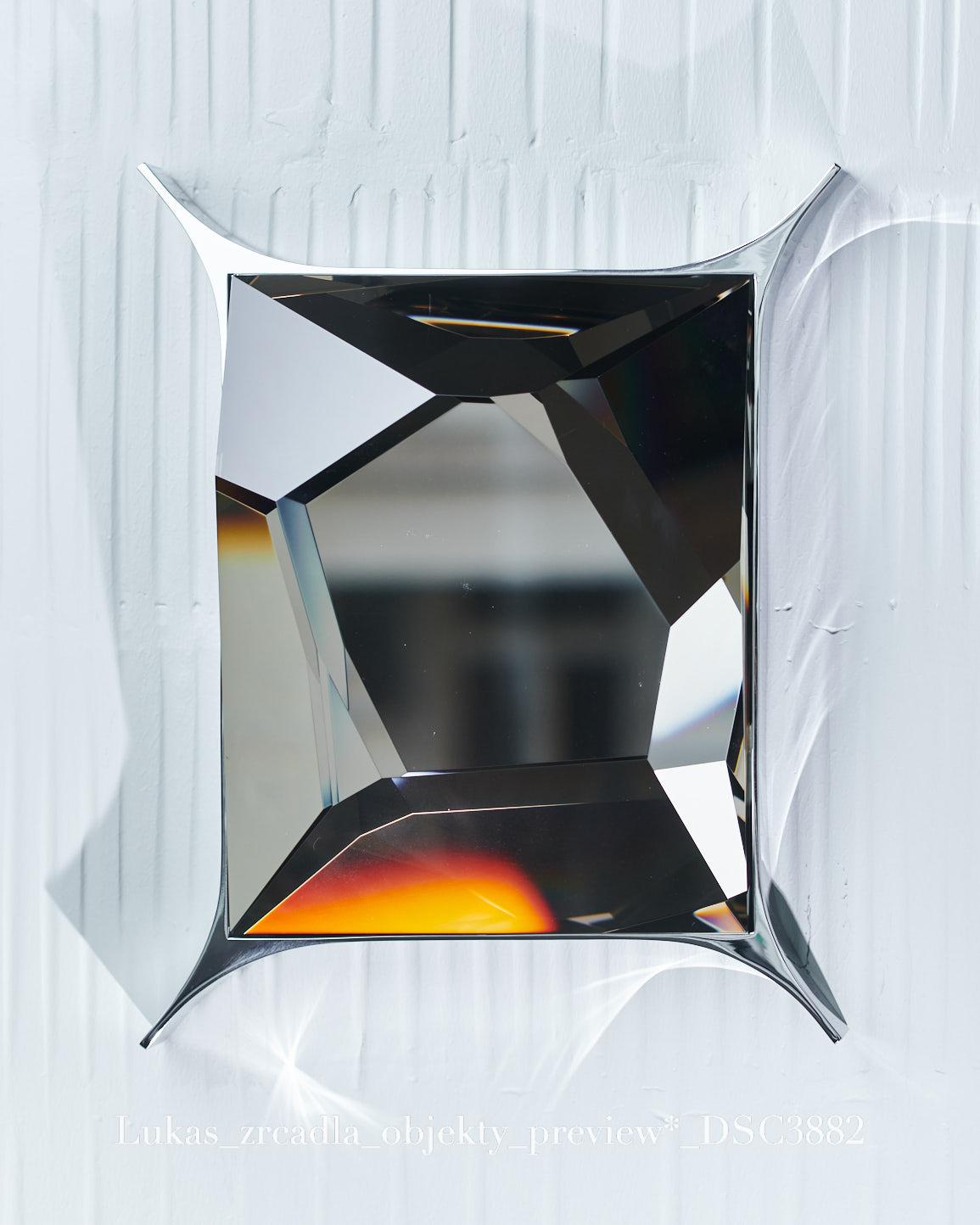 Cut Optical Glass Wall Sculpture by Lukas Novak
Dimensions: D 10 x W 37 x H 47 cm
Materials: Cut Optical Glass

Born in Nový Bor Czech republic which is like capital city of glass in the world. He is an artist, multidisciplinary designer,
