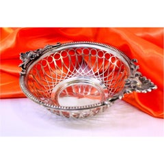 Cut-out silver candy box, pearl trim and raised handles