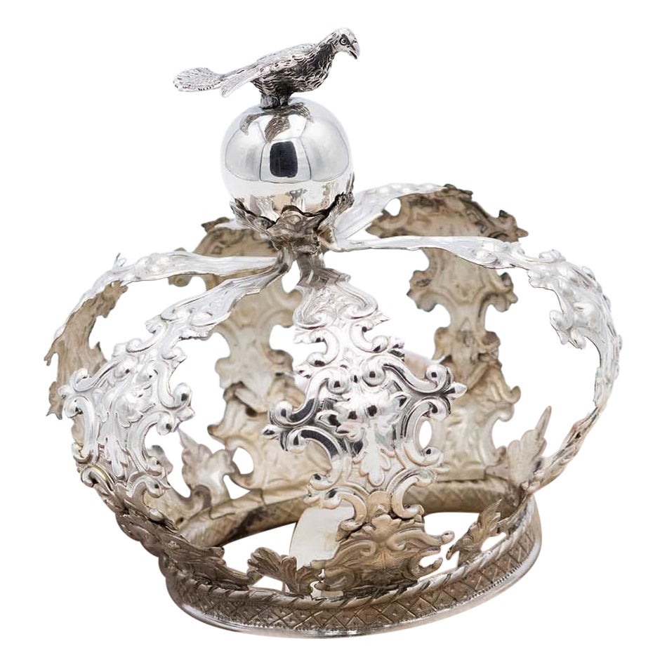 Cut-out silver crown of the Holy Spirit