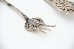 Cut-out silver fish knife and fork