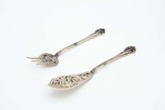 Cut-out silver fish knife and fork