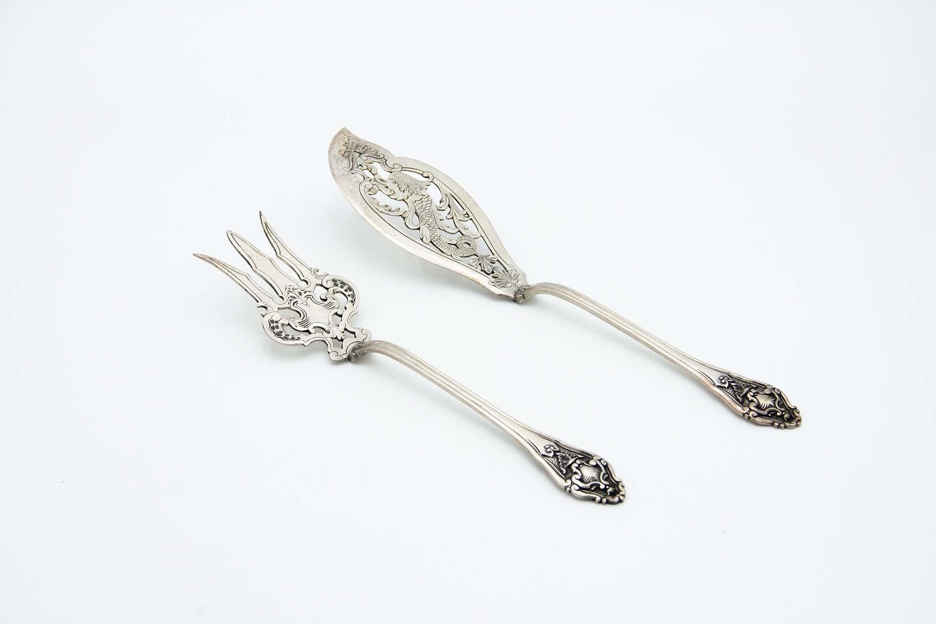 Cut-out silver fish knife and fork