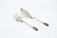 Cut-out silver fish knife and fork