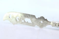 Cut-out silver fish knife