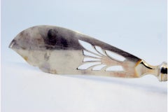 Couteau à poisson en argent découpé