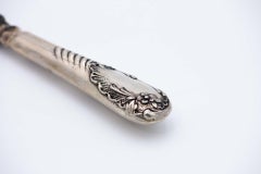 Cut-out silver fish knife