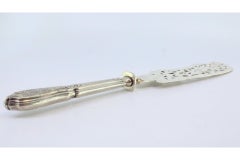 Cut-out silver fish knife