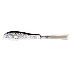 Cut-out silver fish knife with guilloche handle and monogram card