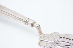 Cut-out silver fish serving spatula