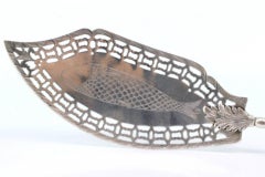 Cut-out silver fish serving spatula