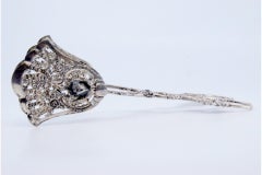 Cut-out silver salad or bread tongs