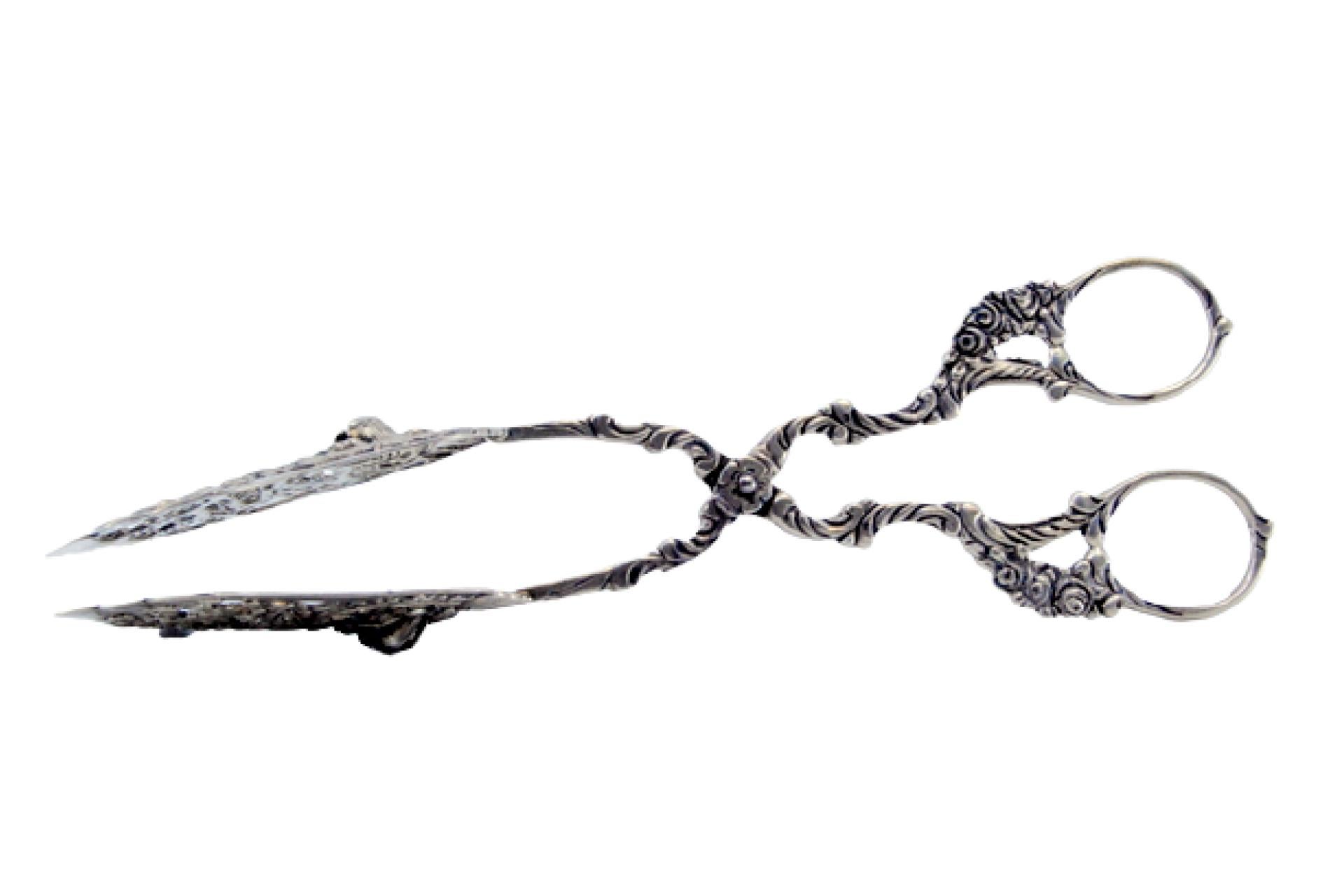 Cut-out silver salad or bread tongs
