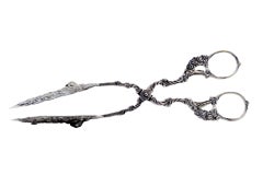 Cut-out silver salad or bread tongs