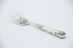 Cut silver fish fork with engraved tines and relief handle