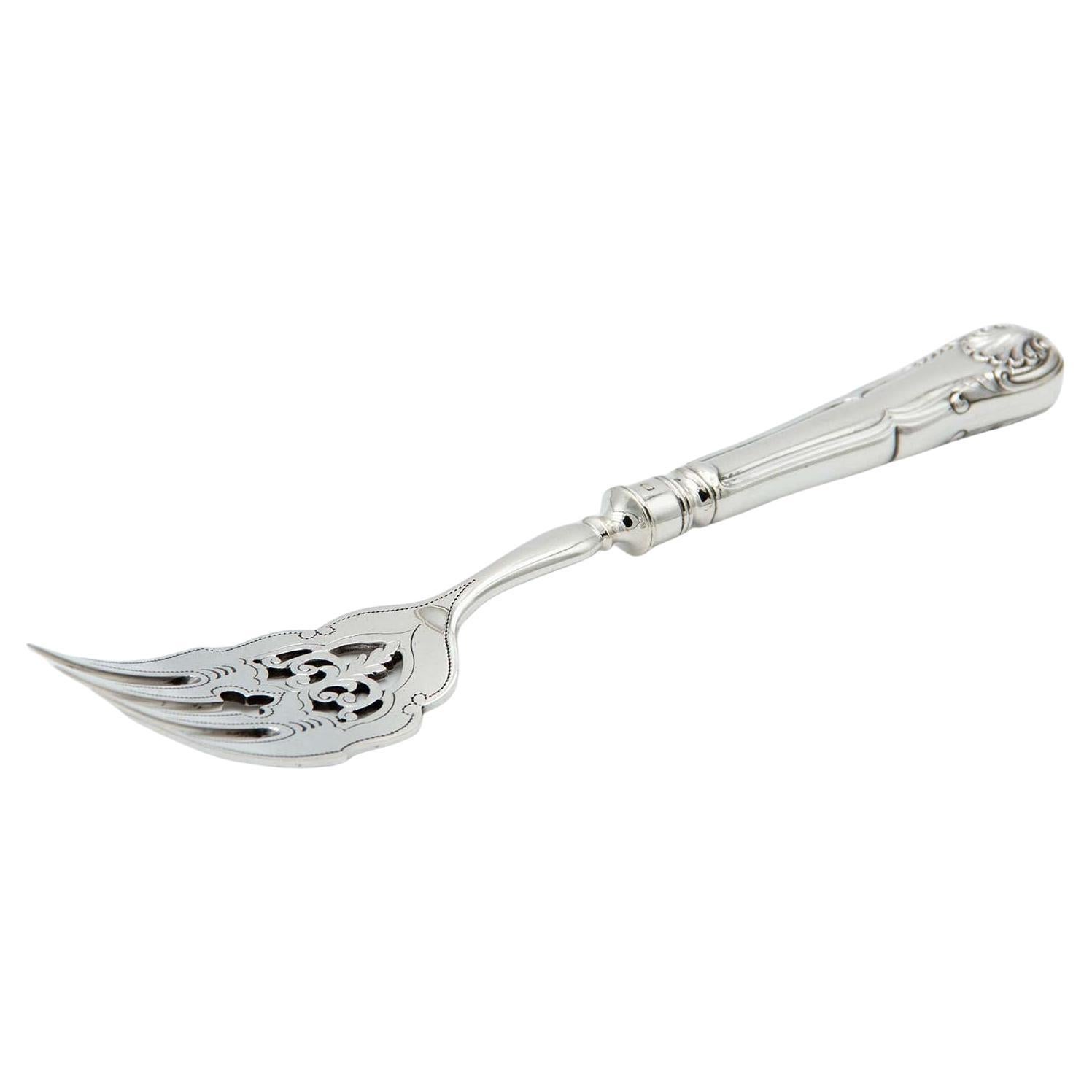 Cut silver fish fork with engraved tines and relief handle