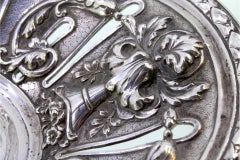 Cut silver fruit bowl with hinged handle and friezes on four openwork feet