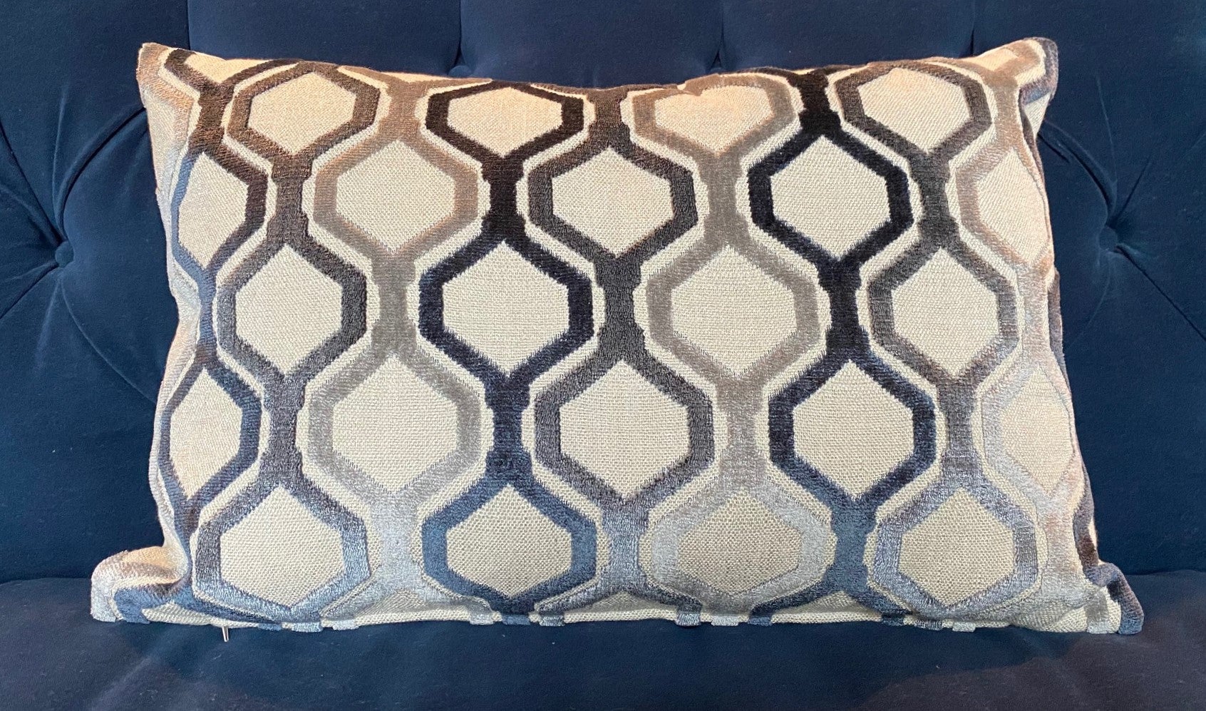 Geometric cut velvet knife-edge rectangular pillow (zippered case and down insert). Steel gray, navy and cream colorway; navy can read almost black in certain light. Reverse side in a contrasting cream velvet. Custom-made by an expert