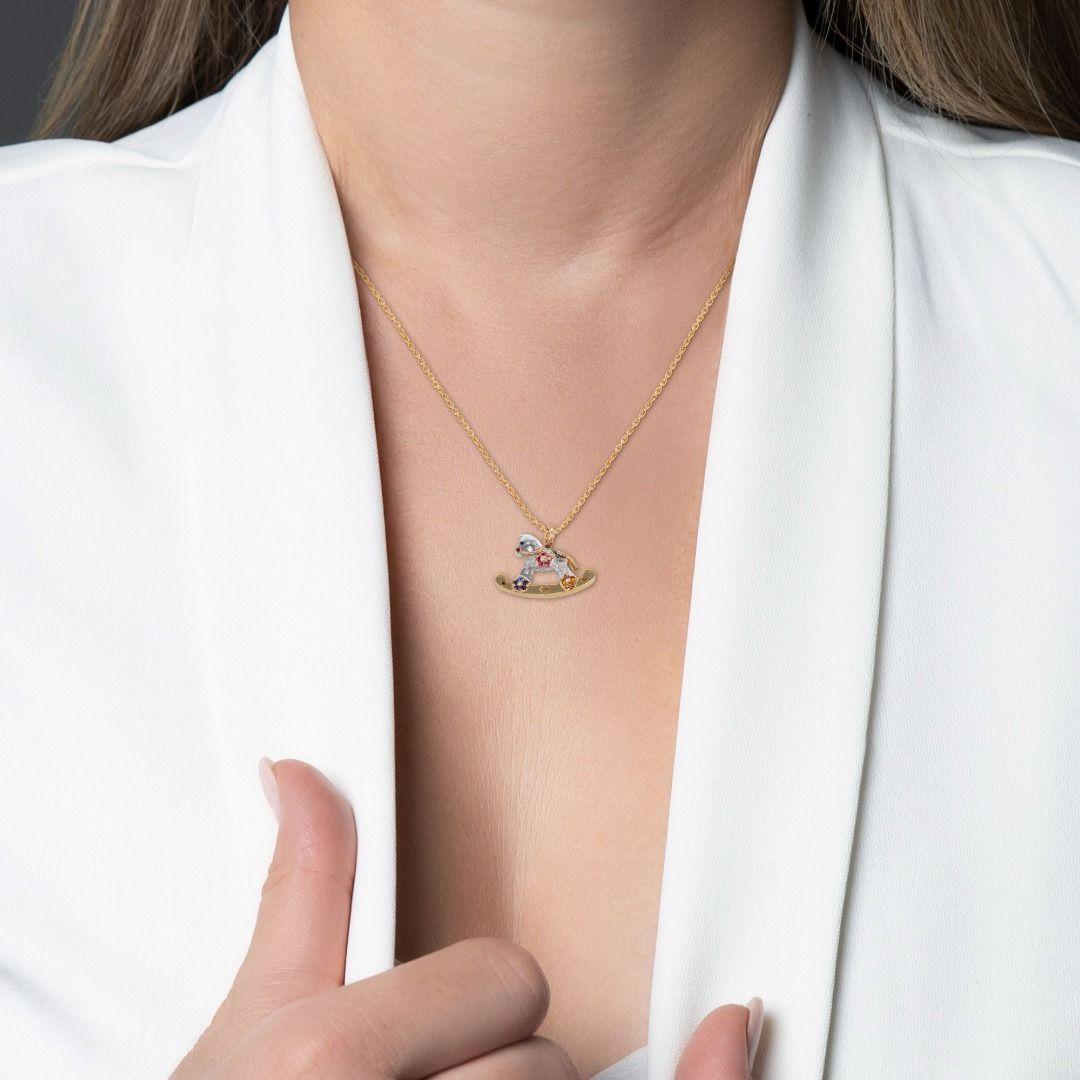 Introducing a stunning expression of elegance and sophistication, this 18K Yellow Gold necklace showcases a harmonious blend of vibrant gemstones and dazzling diamonds. Crafted with meticulous attention to detail, it exudes timeless allure and