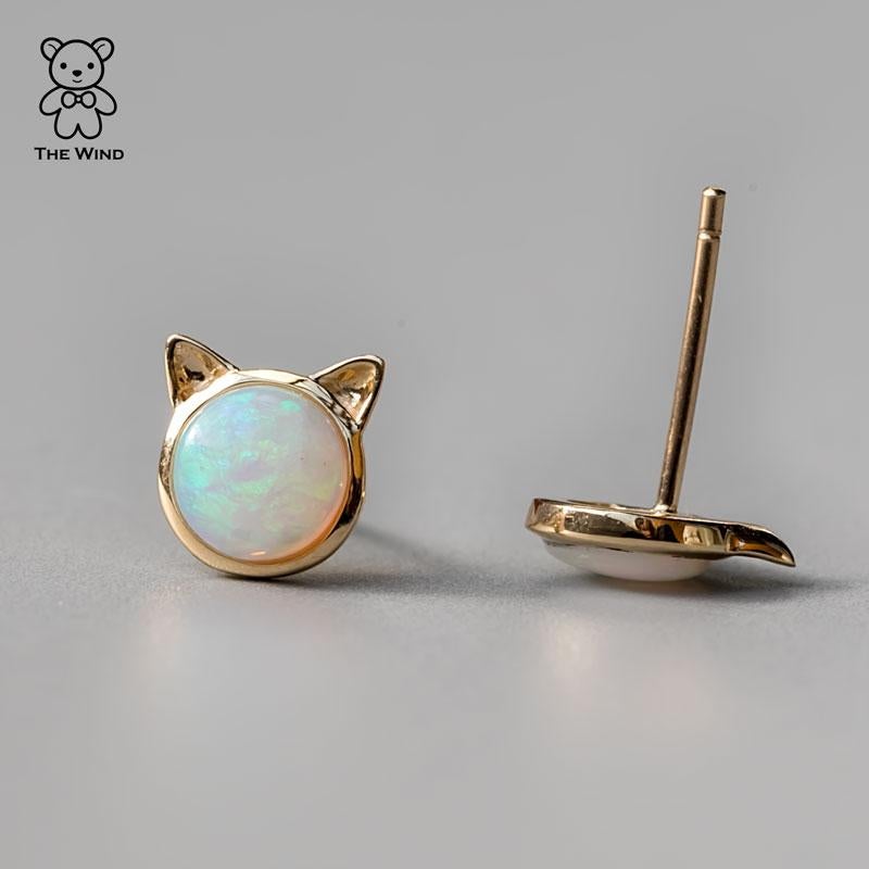 Cute Kitty Cat Ears Round Australian Solid Opal Stud Earrings 14k Yellow Gold.


Free Domestic USPS First Class Shipping!  Free One Year Limited Warranty!  Free Gift Bag or Box with every order!



Opal—the queen of gemstones, is one of the most