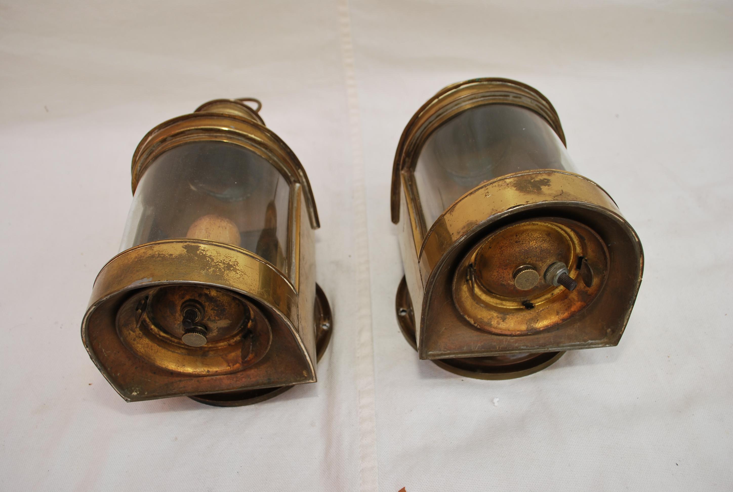 A cute pair of 1920's  brass outdoor sconces, do not worry  about the old wire, we rewire all our sconces, I could see these sconces by a beach house, since it is brass , it won't rust
