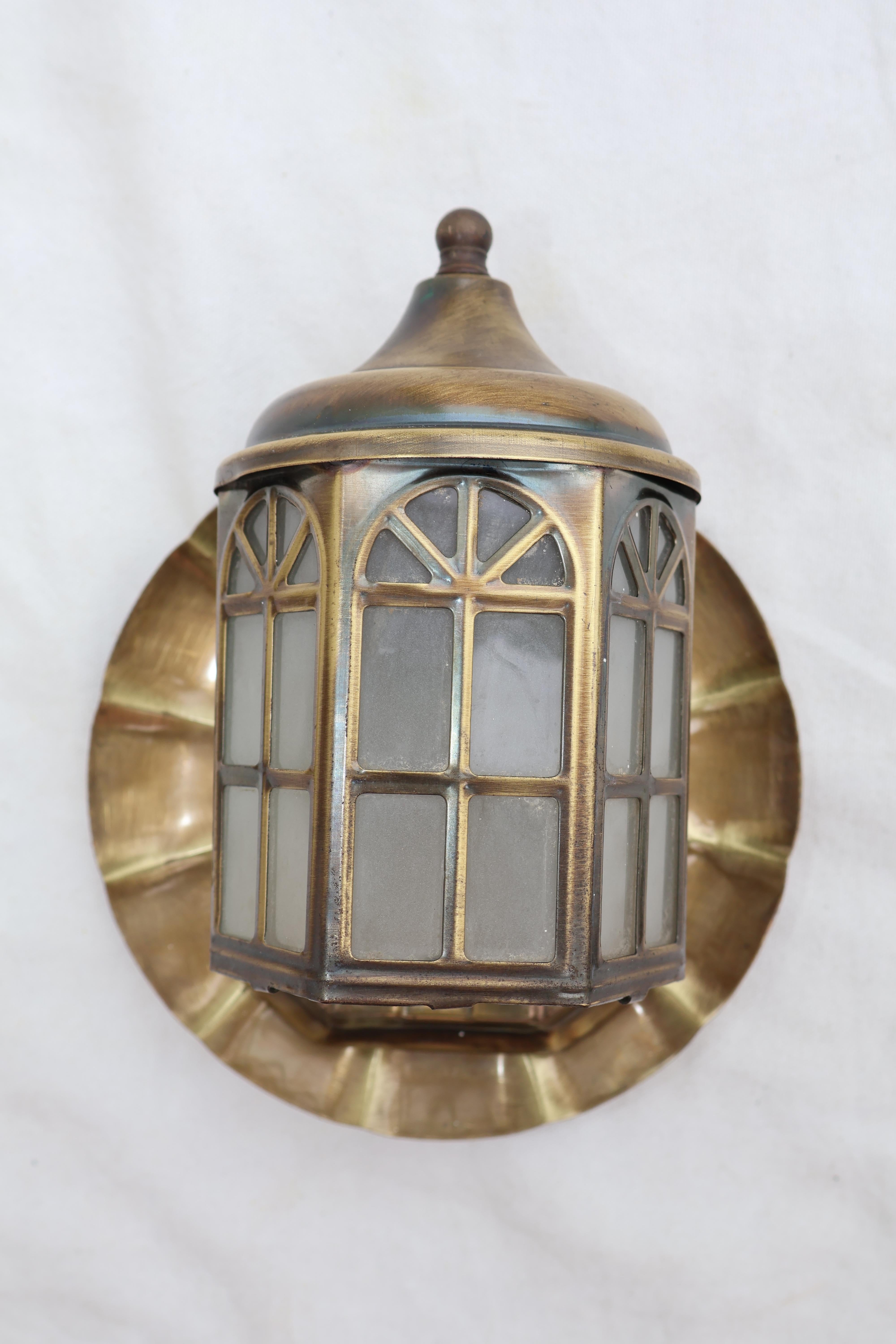 A cute little pair of brass 1950's outdoor or indoor sconces, perfect by the beach