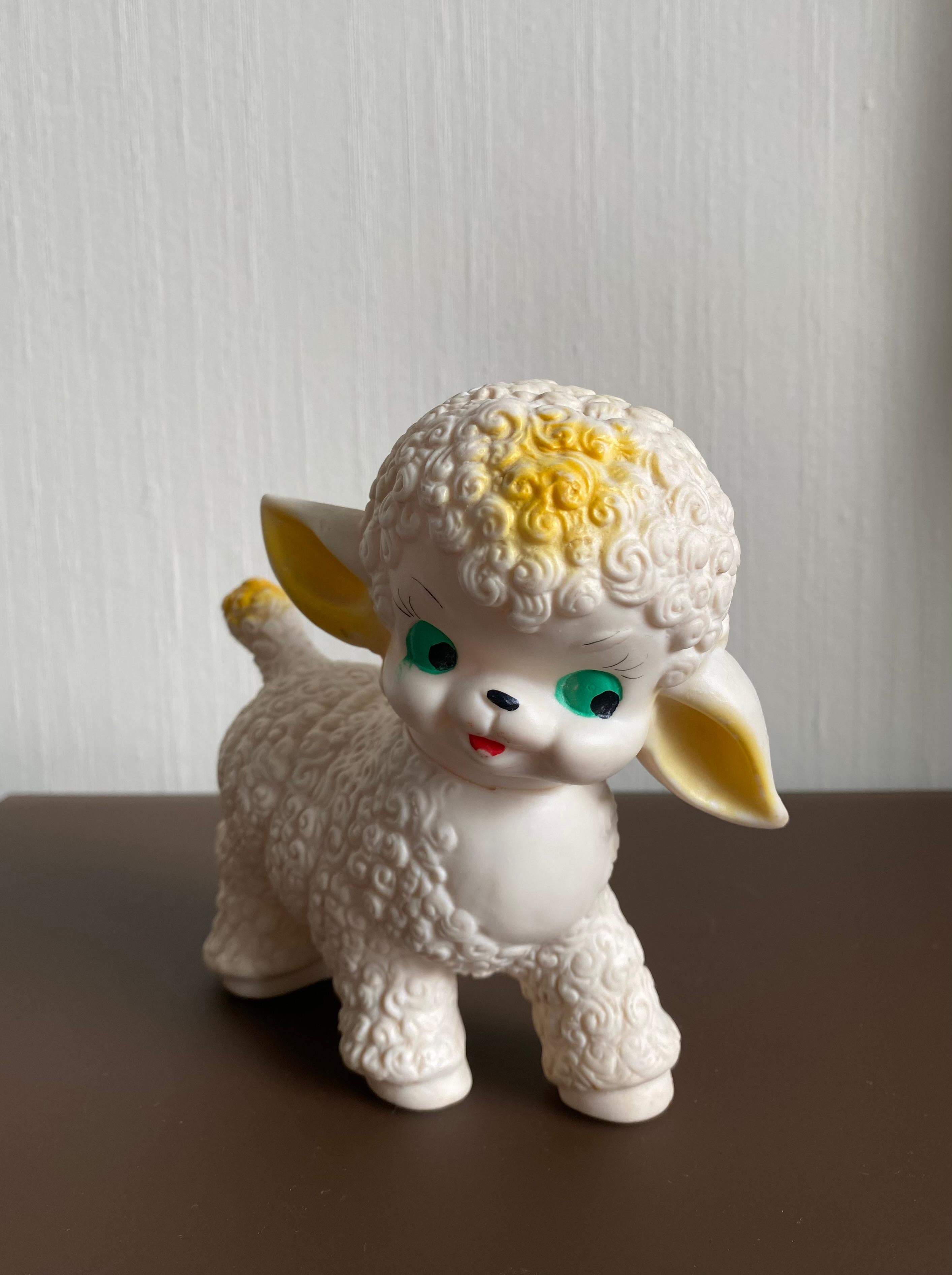 Cute Little Rubber Squeeking Toy, which we believe, features a Lamb. The Lamb features a rotable head which is quite uncommon. Lovely piece which remains in good condition, a working squeeker and with normal signs of age and use.  A true Musthave if