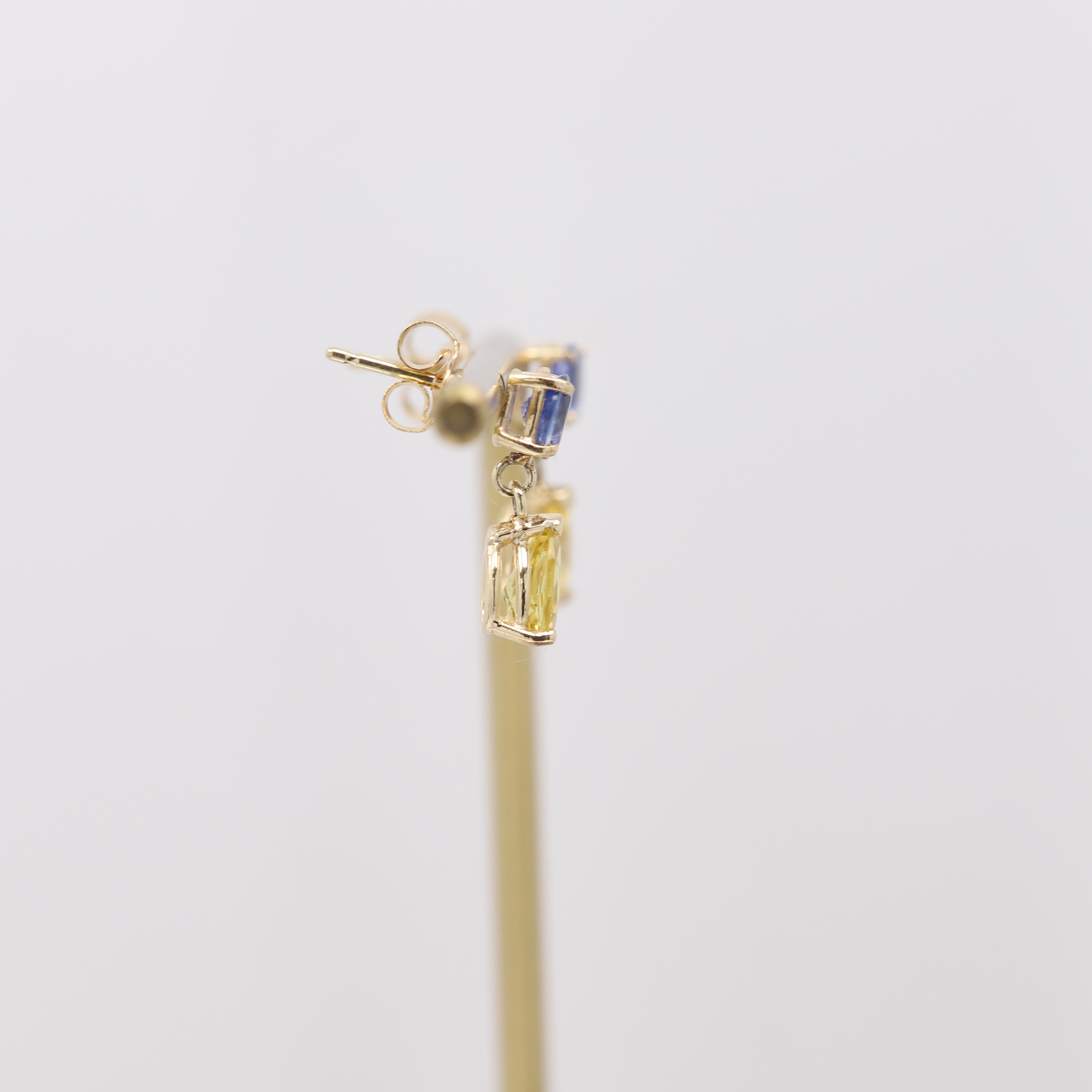 Cute Dangle Earrings
Natural Blue Sapphire & Yellow Citrine
14k Yellow Gold 1.30 grams
Blue Oval shape sapphire 3.6 x 4.6mm
Yellow Pear Shape citrine 6 x 4 mm
Approx Total 1.40 Carat 
Total 1.30 grams real 14k Gold
Standard Butterfly Push