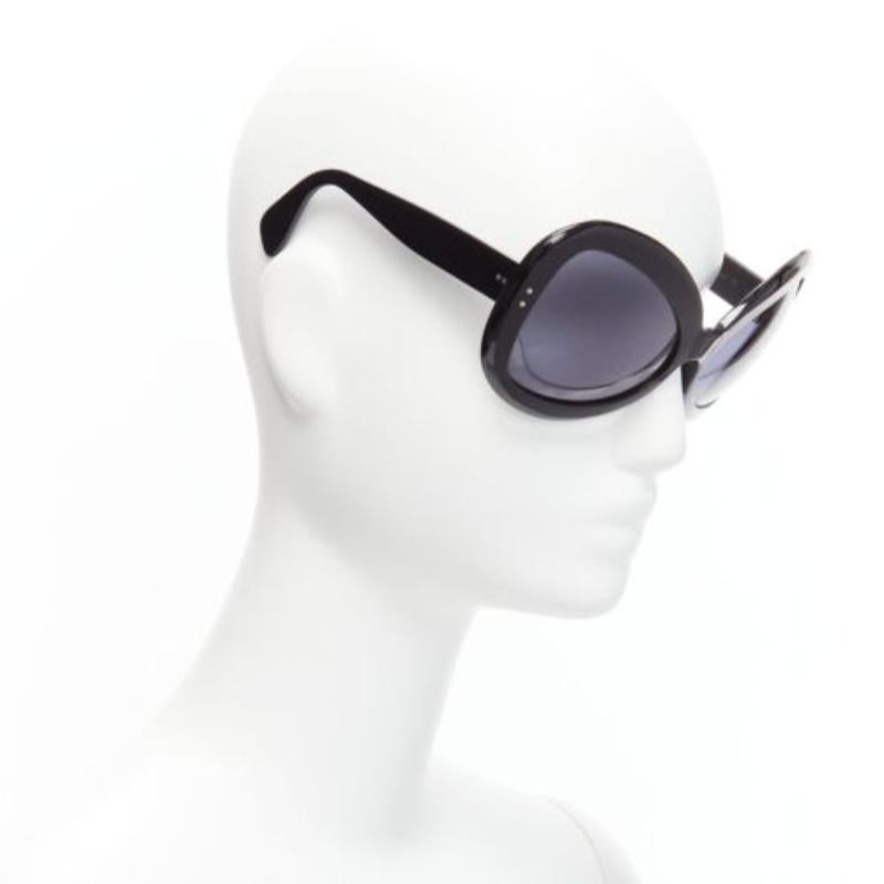 Nero CUTLER AND GROSS M0812 occhiali da sole a farfalla con lenti nere e grigie in vendita