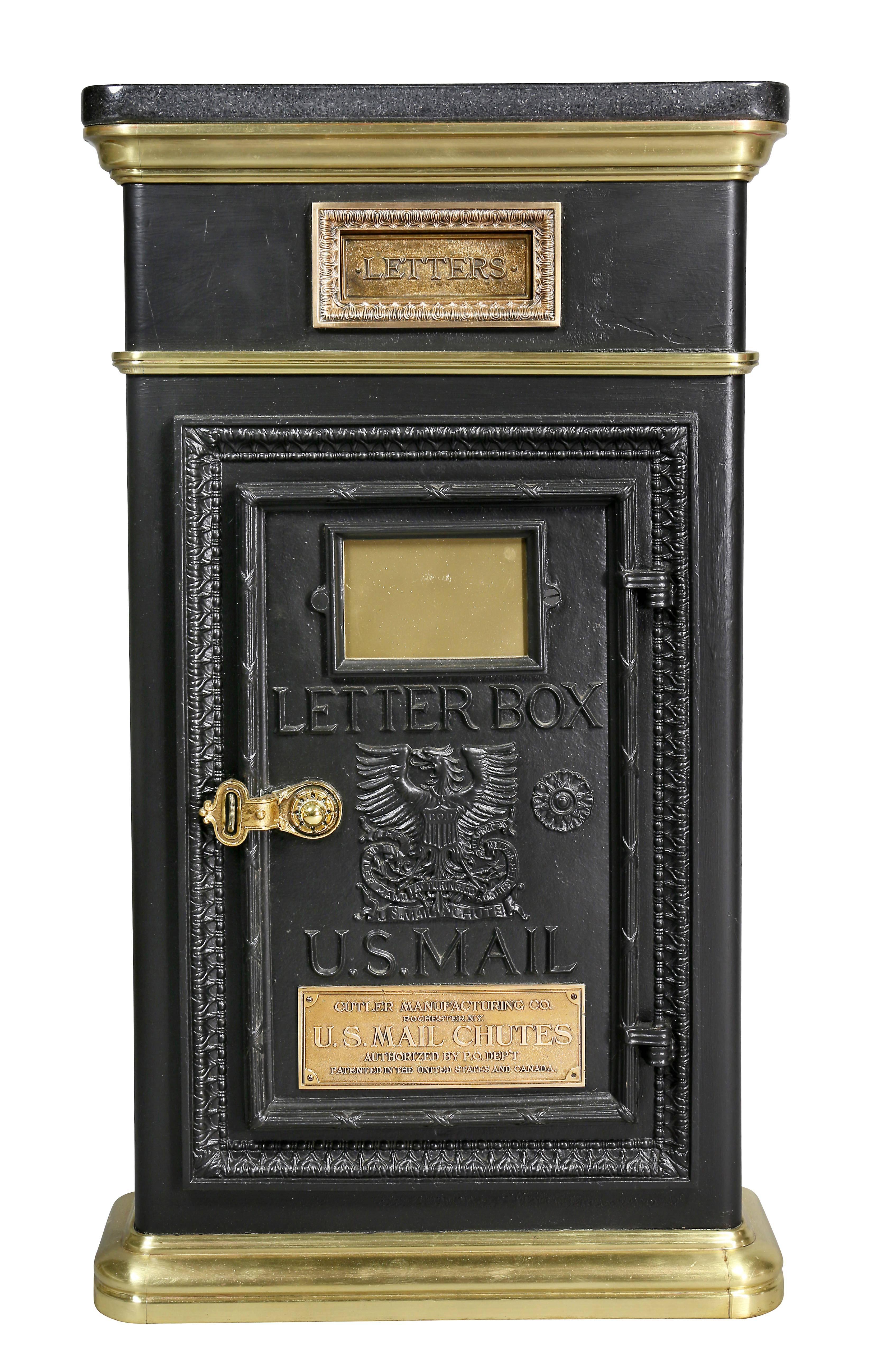 Now with a black marble-top with mail slot and door with embossed inscription.