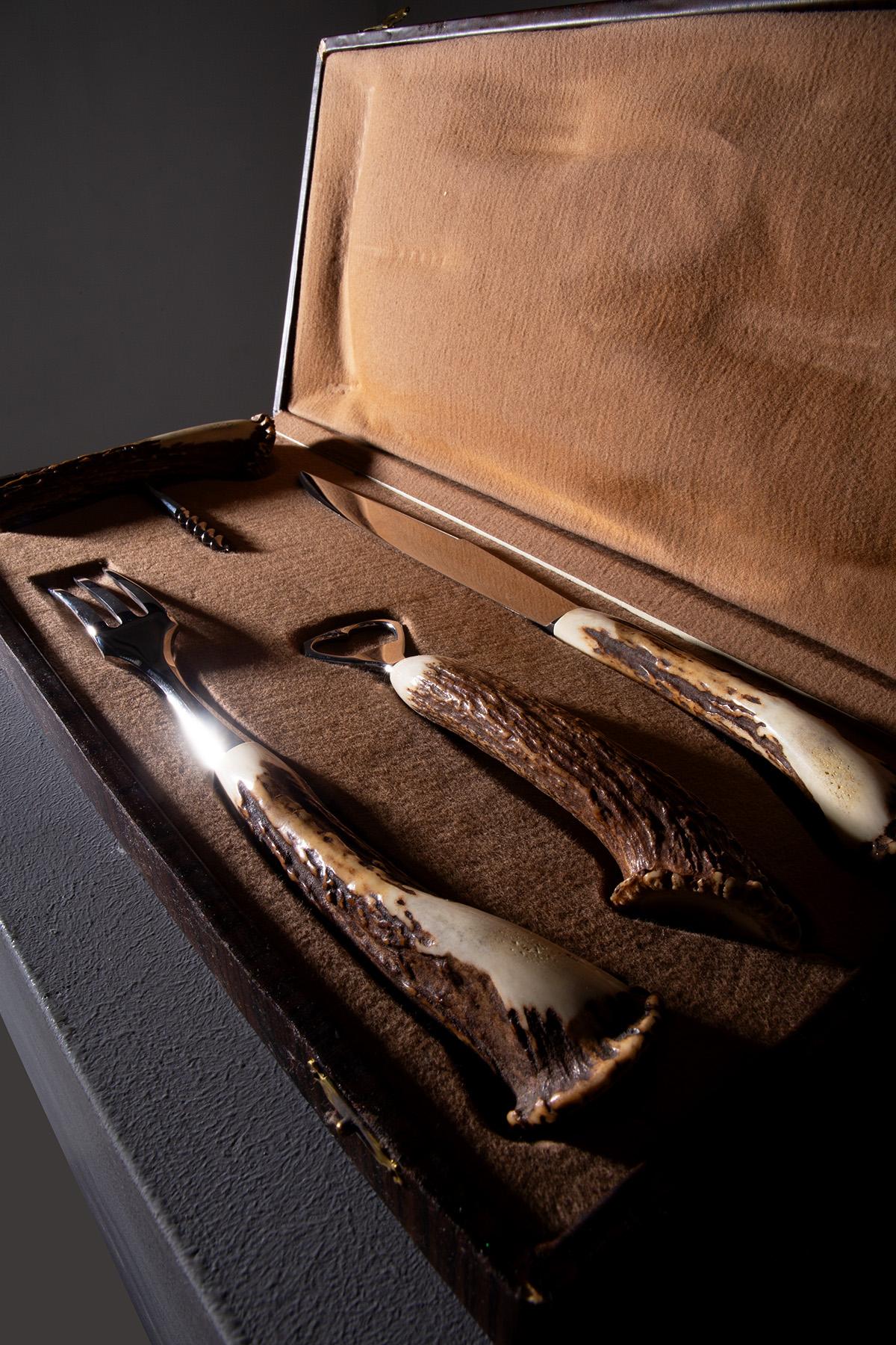 This cutlery and wine accessory set, crafted by the prestigious Lorenzi manufactory in Milan, represents the pinnacle of Italian craftsmanship. The blades are forged from durable stainless steel, ensuring longevity and precise cutting over
