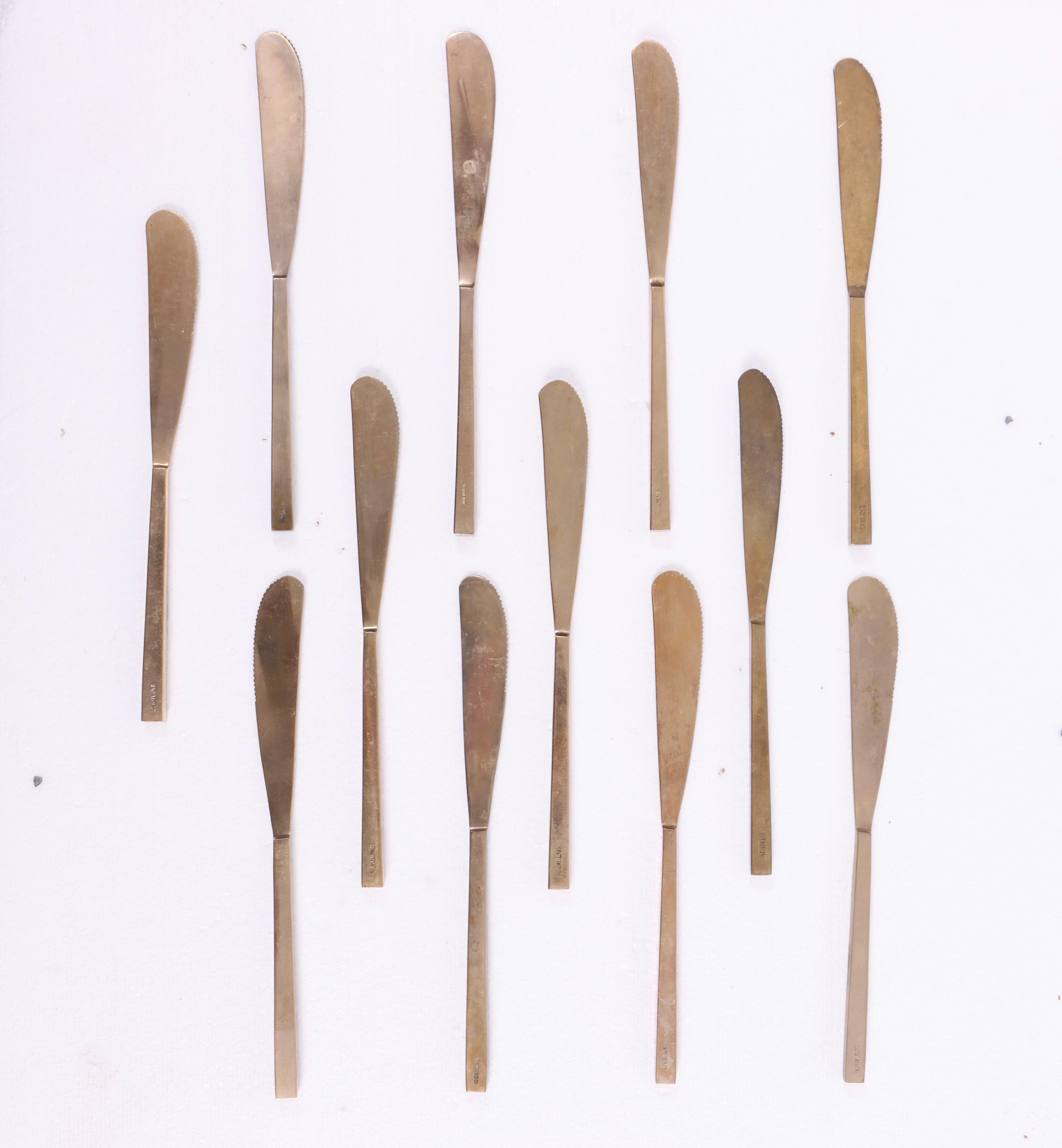 Cutlery for 12 persons in solid bronze designed by Scanline. Made by Broste Denmark in the 1960s .