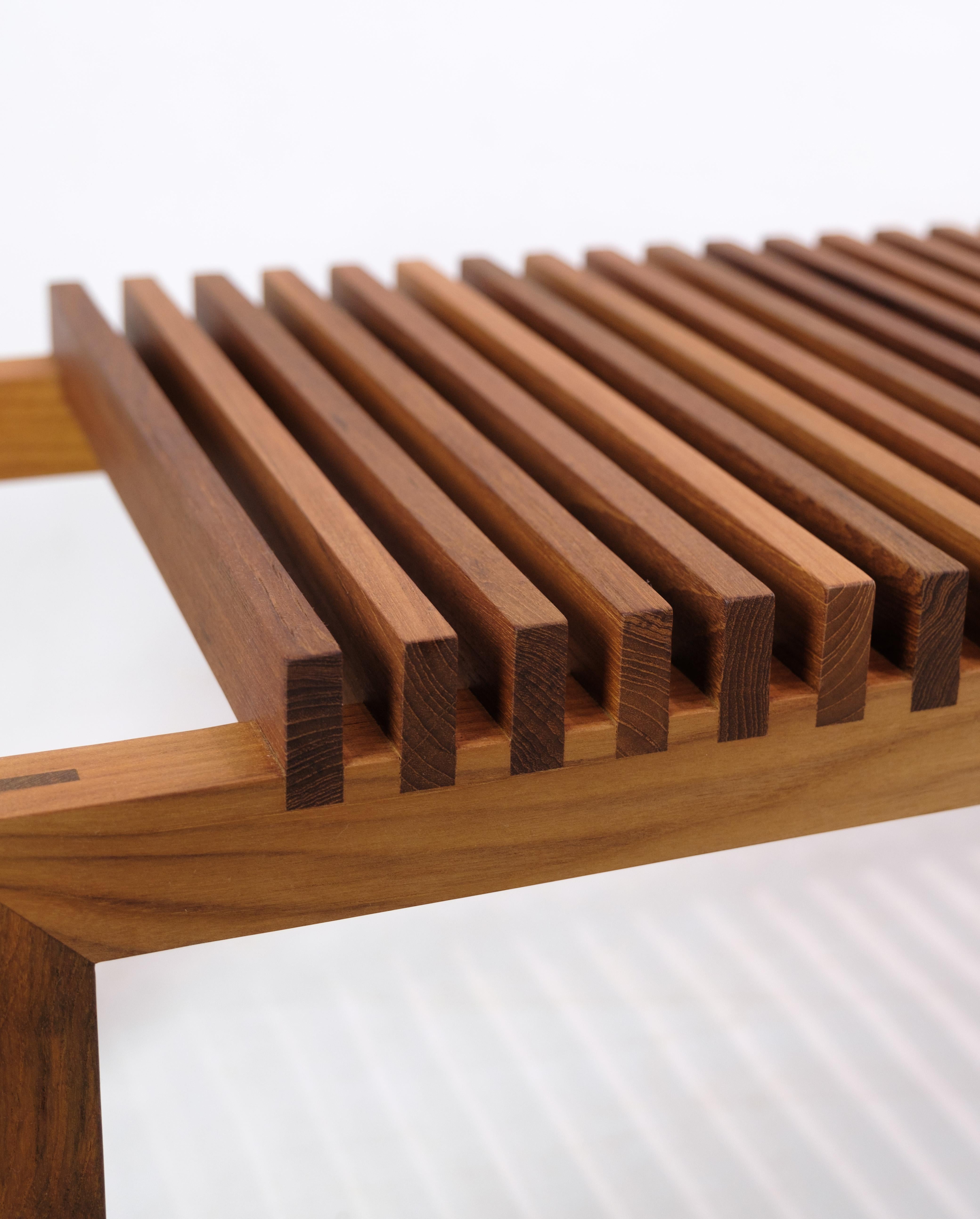 Danish Cutter Bench designed by Niels Hvass in teak wood of minimalist design 