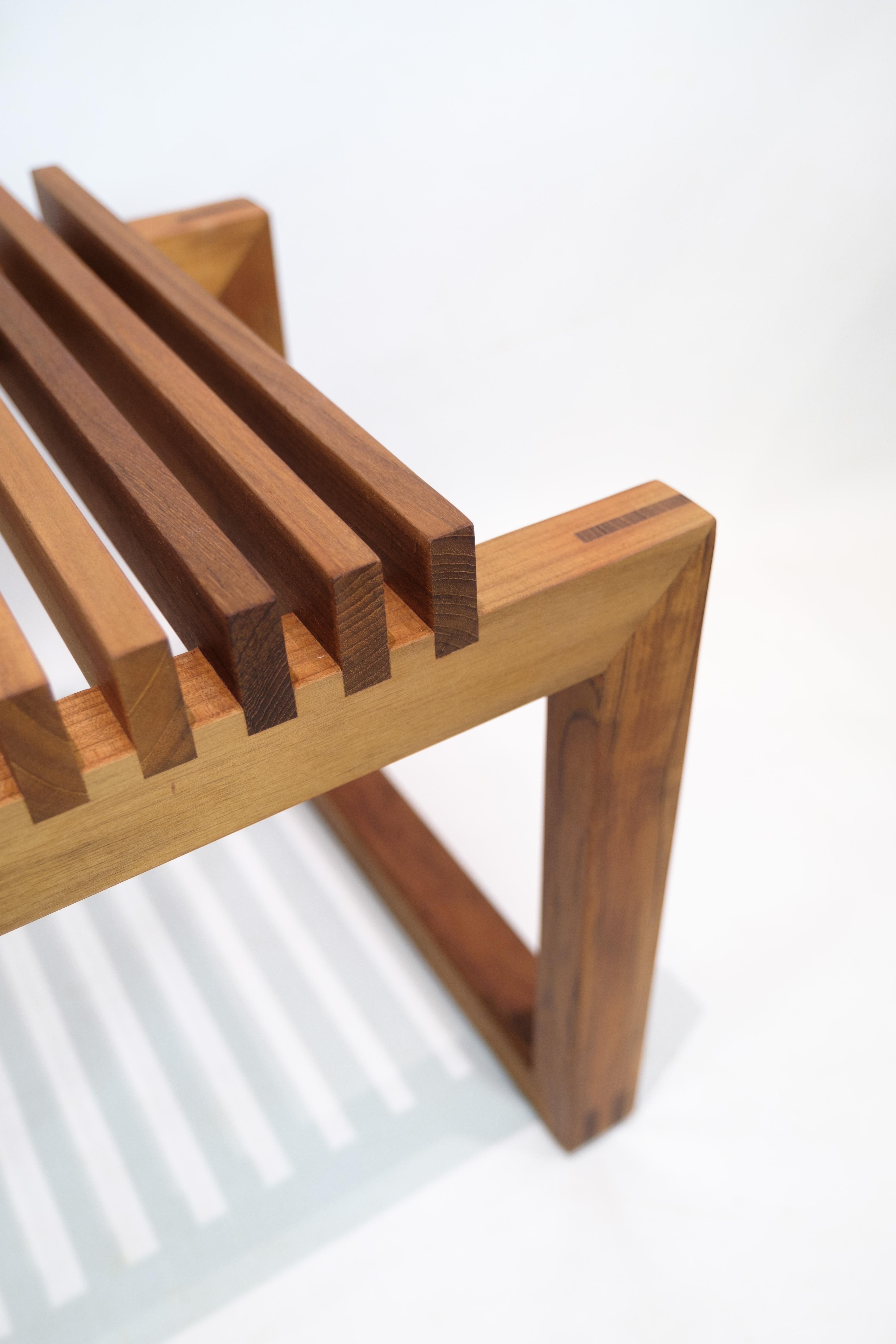 Teak Cutter Bench designed by Niels Hvass in teak wood of minimalist design 