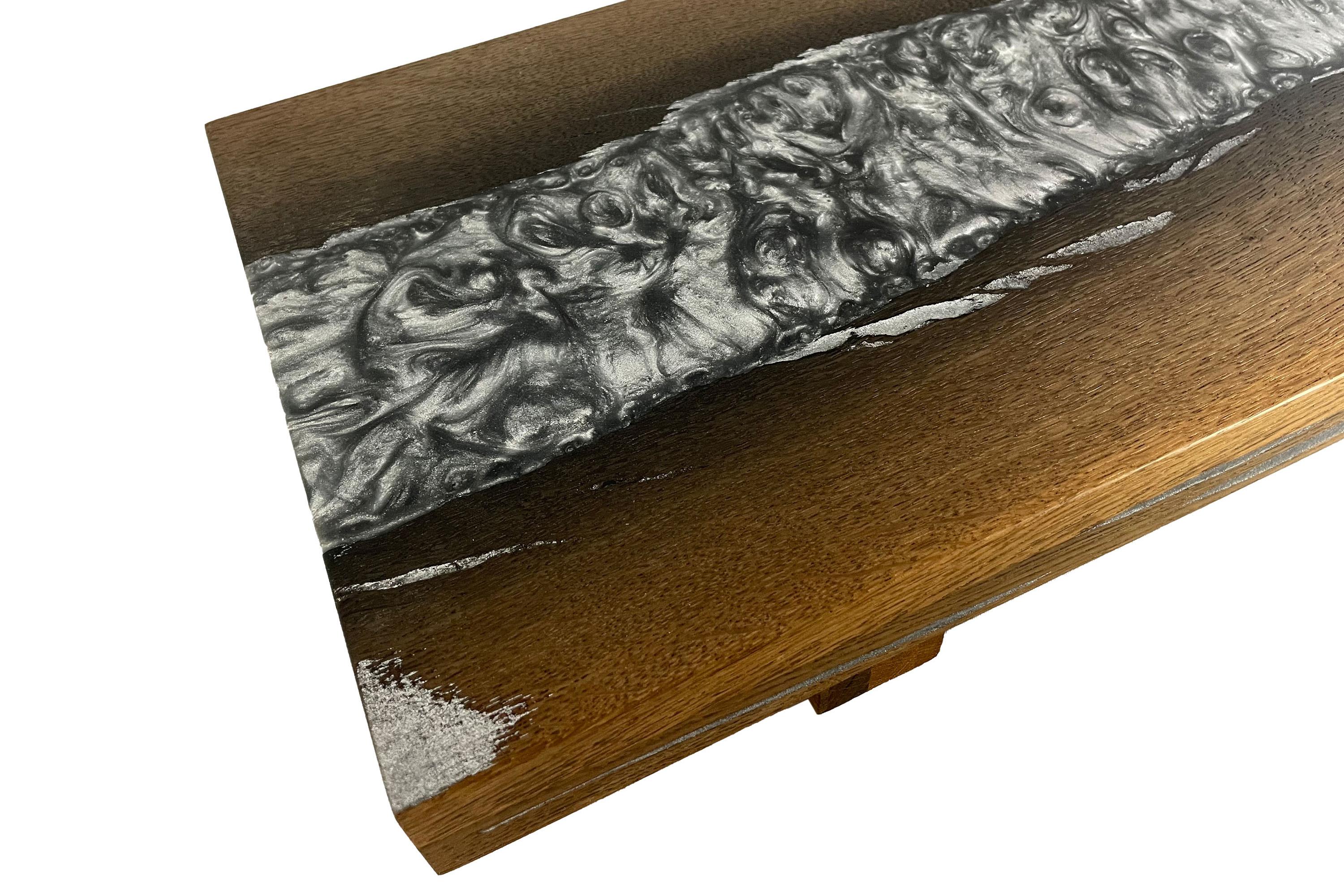 Carved  Cutting board made of bog oak refined with silver expocide resin For Sale