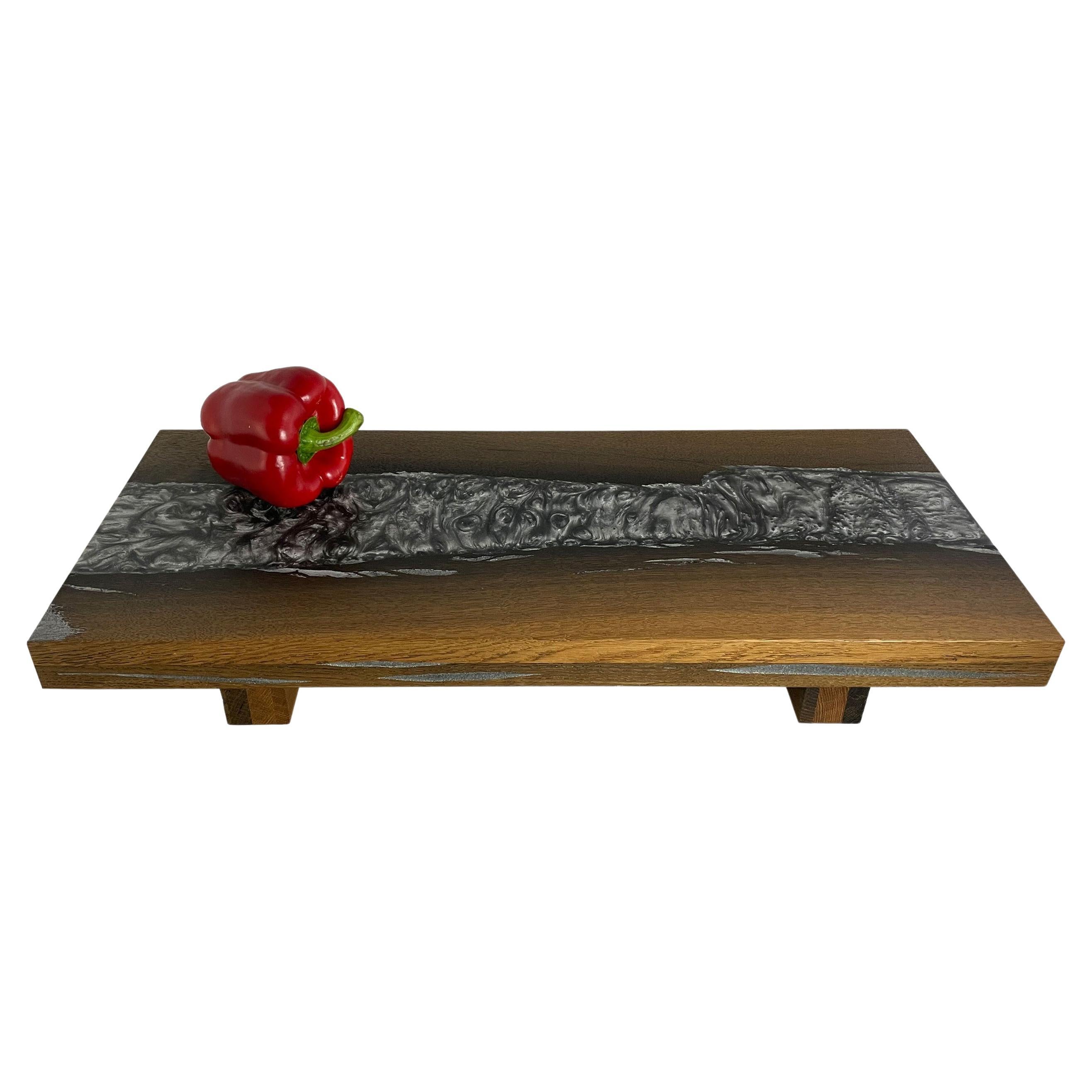 Cutting board made of bog oak refined with silver expocide resin For Sale