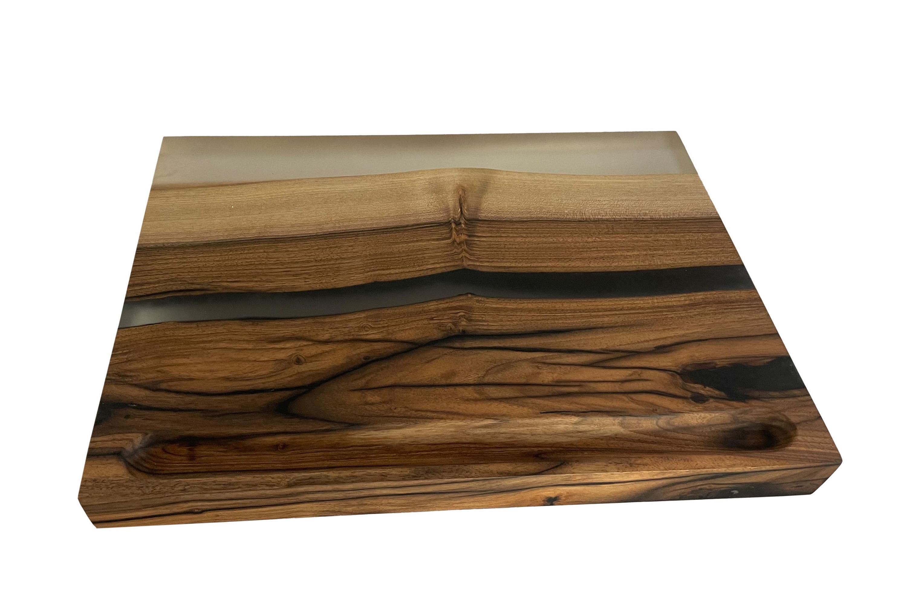 Carved Cutting board made of walnut and cast with epoxy For Sale