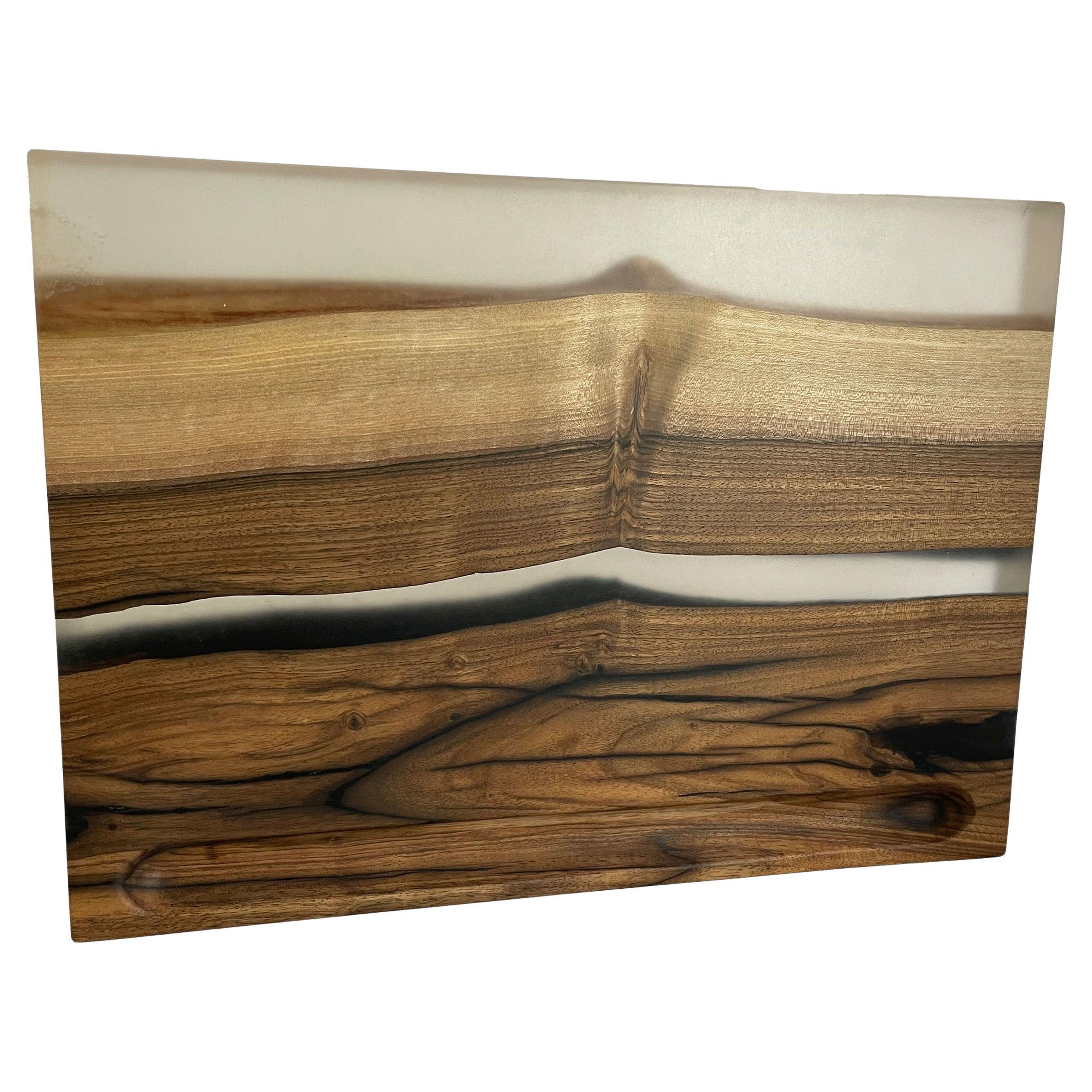 Cutting board made of walnut and cast with epoxy For Sale