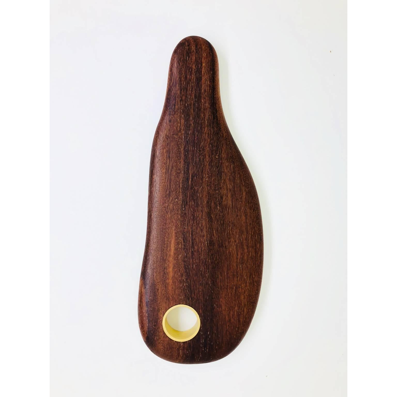 The cutting gourmet board is made in Brazilian solid wood Sucupira with brass insert. Finishing in mineral oil suitable for food.
To maintain the cutting gourmet board after use, wash in cold water with a neutral soap. Leave in an open surface to