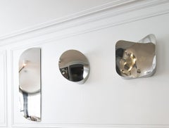 Cutting Space Round Mirror in Polished Stainless Steel by Haymann Editions