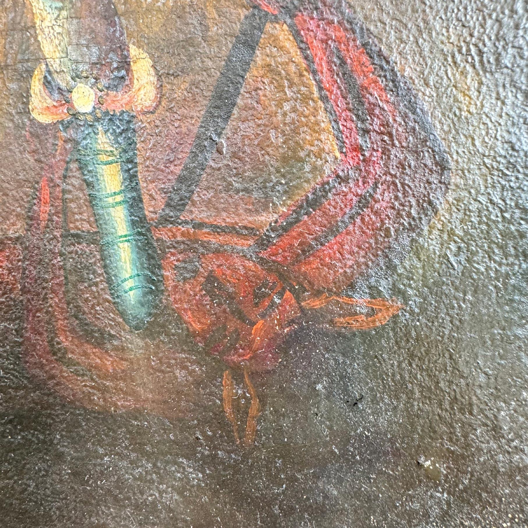 Óleo sobre lienzo de la Escuela Cusqueña del Arcángel Miguel derrotando a Satanás Siglo XVIII Peruano en venta