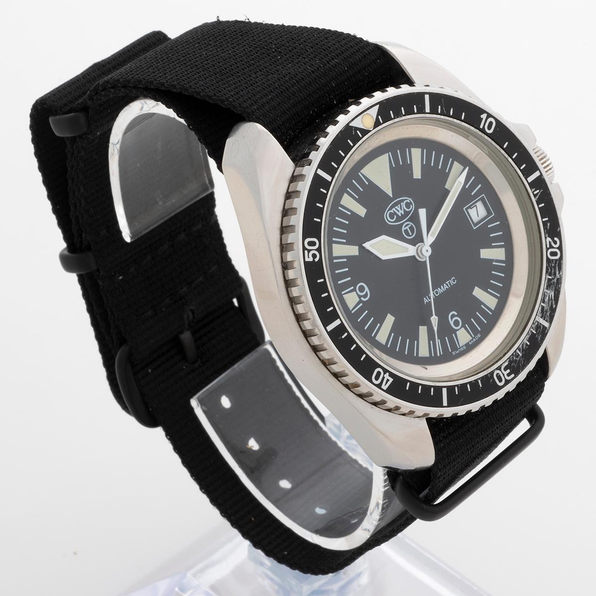 Our rare CWC automatic Royal Navy Diver's watch, is presented in very good unrestored condition, with signs of use overall. This example has the T logo to the dial and broad arrow / pheon to the case back, serial C256/04 indicating production or