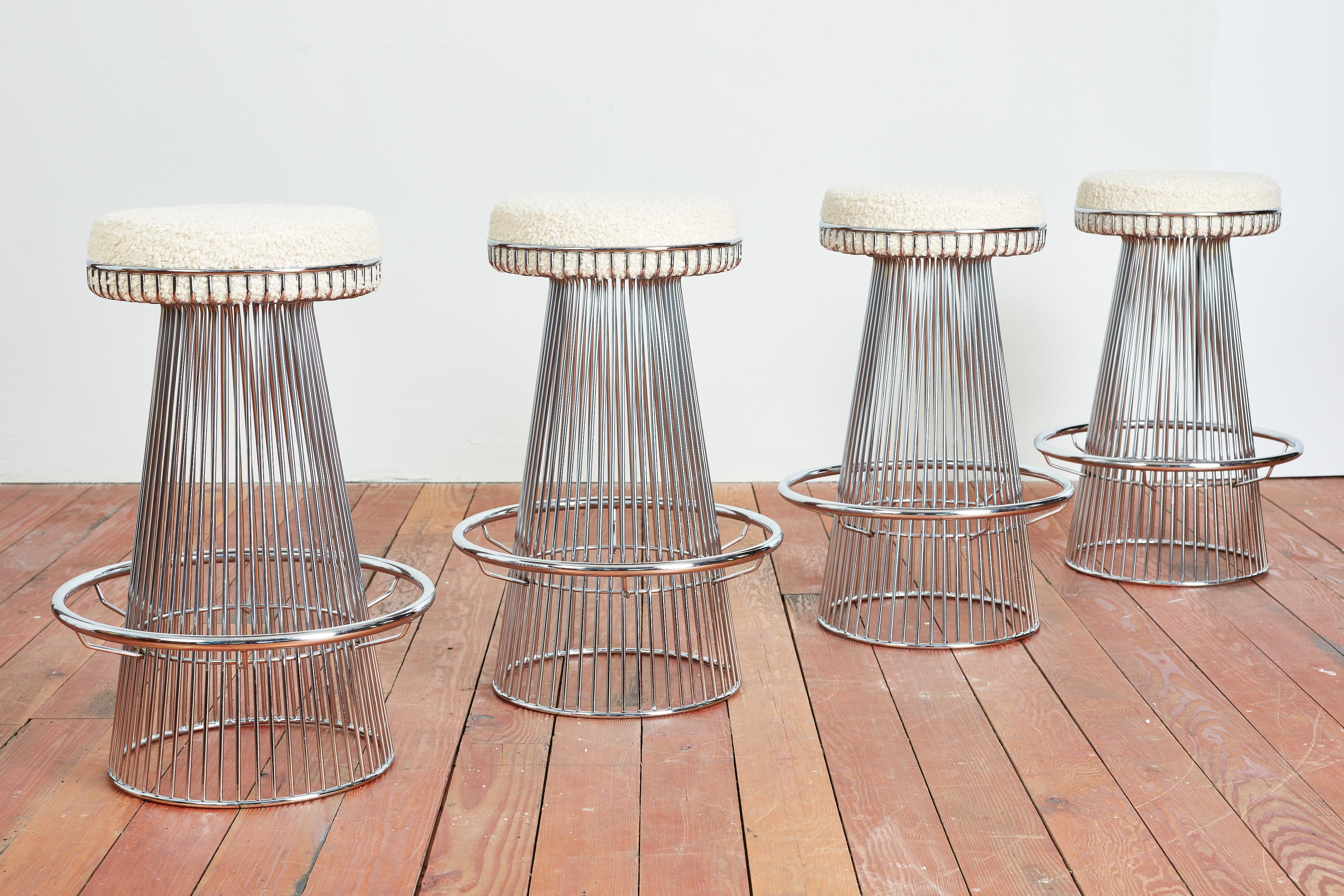 Cy Mann barstools with polished chrome base and seats reupholstered in wool boucle 
Priced individually 
